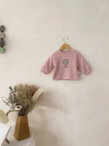 Sudadera de manga larga de canalé para niña pequeña en rosa con estampado de margarita.