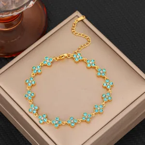 Gold-plated blue zircon four-leaf clover bracelet, elegant dopamine titanium steel jewelry for women.