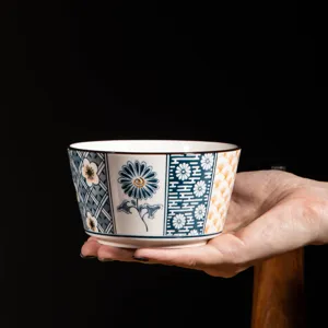 Japanese style ceramic bowl detail view featuring traditional blue and white floral patterns.