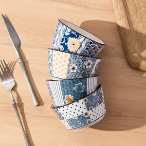 Japanese style ceramic rice bowls set with blue and white floral patterns for kitchen dining.