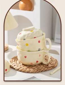 Ceramic instant noodle bowl with handle and lid, cute polka dot design for daily kitchen use.