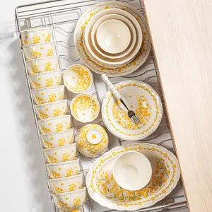 Céramique vaisselle motif floral jaune, bols de riz, bols à soupe et assiettes pour cuisine.
