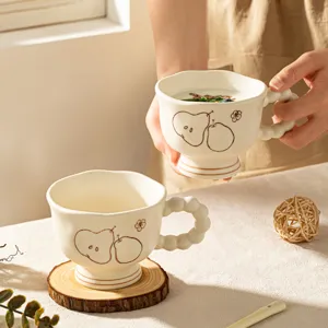 Retro INS ceramic coffee mug with cute pear pattern and beaded handle for home use.