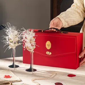 Luxury champagne glass gift set with sparkling tassels and elegant box for weddings.