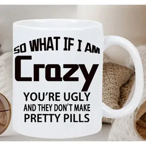 White ceramic coffee mug with funny text print, perfect for office and daily use.