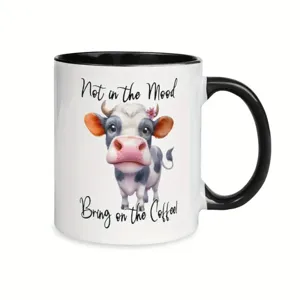 Ceramic coffee mug with cute cow design and funny quote text, perfect for office or home use.