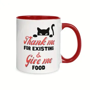 Detailed view of the ceramic coffee mug featuring funny cat graphic and contrasting red handle.