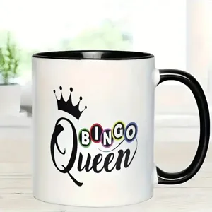 Ceramic coffee mug detail, black and white design with custom crown text for office use.