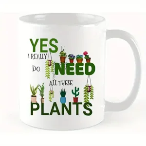 Taza de café de cerámica blanca con diseño de plantas verdes para el hogar y oficina.