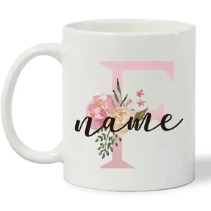 Customizable white ceramic coffee mug featuring beautiful floral letter detail design.
