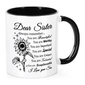 Schwarz-weißer Keramik-Kaffebecher mit Schwester-Spruch, perfektes Geschenk für Büro und Alltag.