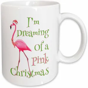 Detailed closeup view of a white ceramic coffee mug featuring festive flamingo graphic.