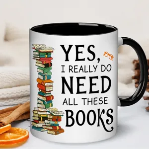 Ceramic coffee mug with black handle and book lover quote design for daily office use.