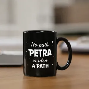 Black ceramic coffee mug with white printed custom text, suitable for office and home use.