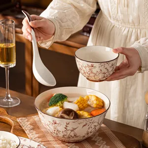 Ceramic tableware set with brown floral pattern, elegant kitchen dinnerware for home.
