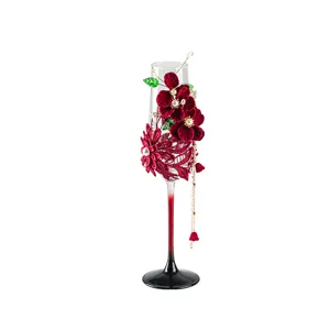 Elegant red velvet floral wedding champagne glass, decorative toasting goblet for bridal gift.