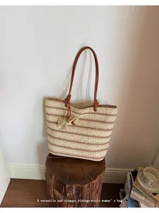 Vintage striped straw tote bag for women, summer shoulder bag for daily commute.
