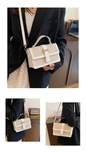Details of the stylish woven straw flap crossbody bag with top handle for women vacation.