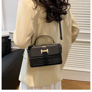 Black woven crossbody handbag with metallic H clasp, stylish daily commuter casual shoulder bag.