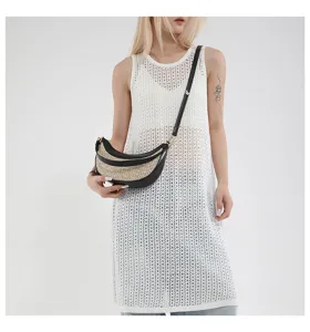 Detailed view of the stylish women crescent straw shoulder bag, perfect for beach and vacation.