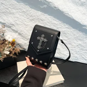 Black mini crossbody bag with gothic metal cross and star studs, stylish punk shoulder bag.