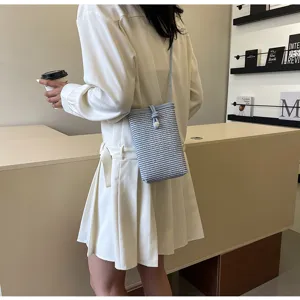 Woven crossbody phone bag for women, stylish small casual shoulder bag with pearl decor.