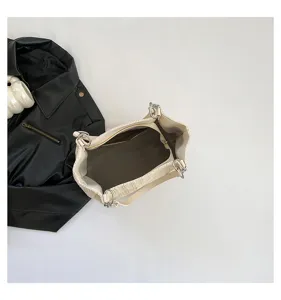 Detailed view of the chic summer woven straw shoulder tote bag with zipper closure and spacious interior.