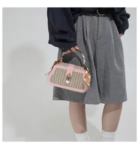 Chic straw woven handbag with pink leather trim, twilly scarf and metal lock for women.