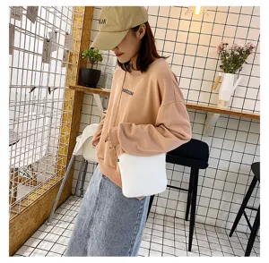 Minimalist white plush cross-body chain bucket bag, soft fluffy winter shoulder bag for daily outfit.