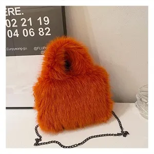 Orange faux fur chain shoulder bag fluffy crossbody handbag stylish plush winter purse detail