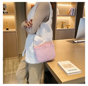 Pink plush shoulder crossbody bag for women, cute fluffy winter handbag with chain strap.