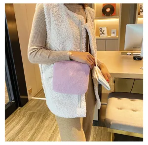 Cute fluffy plush crossbody bag for women, soft fuzzy shoulder bag in light purple for autumn winter.