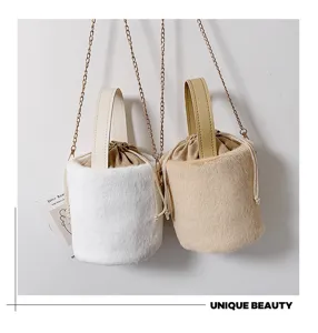 Autumn winter plush bucket shoulder bag with chain strap and drawstring closure style.