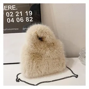 Cozy plush fluffy shoulder bag with stylish metal chain strap for autumn winter fashion.