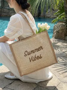 Large capacity woven straw tote bag for women, stylish single-shoulder resort beach bag.