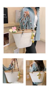 Woven ribbon tote bag large capacity straw bucket shoulder bag with cute plush pendant detail