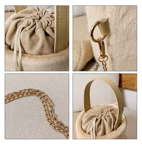 Plush bucket bag detail showing soft faux fur texture, drawstring closure, and chain.