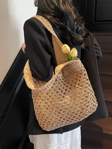 Handgemachte hohle Papierkordel gewebte Stroh-Shopper-Tasche für Damen, stylische Freizeit-Tasche.
