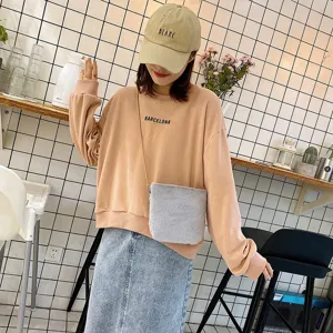 Cute grey plush crossbody bag for women, soft furry shoulder bag with chic chain strap.