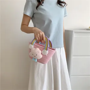 Mini woven plush cloud bucket bag with colorful handles. Cute sweet style, perfect handbag detail.