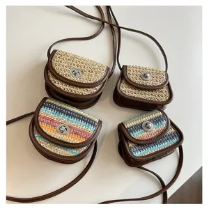 Mini straw crossbody bag, cute woven shoulder bag with metal lock detail for women.