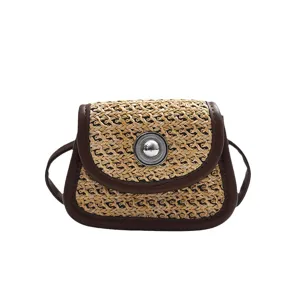 Trendy straw woven mini crossbody bag for women, stylish color block leather trim shoulder bag.