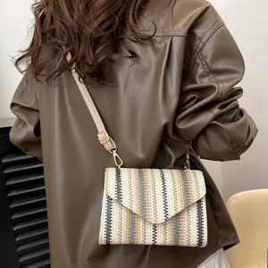Fashion straw crossbody bag for women, trendy colorful striped shoulder phone bag for beach.