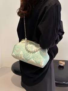 Chinese style embroidered jacquard handbag with elegant pearl chain handle for women.