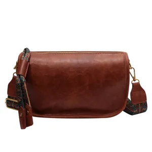 Brown soft leather casual crossbody bag, stylish wide strap shoulder pillow bag for daily use.