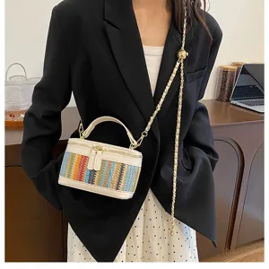 Chic summer woven box bag with metal chain strap and top handle for women stylish daily wear.