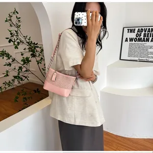 Roze geweven stro patchwork schoudertas, stijlvolle zomer ketting emmer hobo handtas.