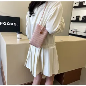 Minimalist solid color straw woven phone bag, casual chic crossbody bag for daily wear.
