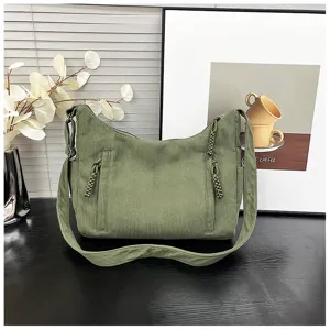 Corduroy shoulder bag detail, casual green crossbody bag with zipper pocket and daily use.