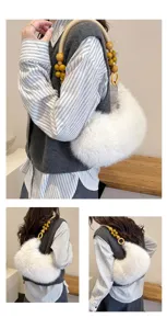 Detail view of winter white plush handbag with decorative wooden bead handle and strap.